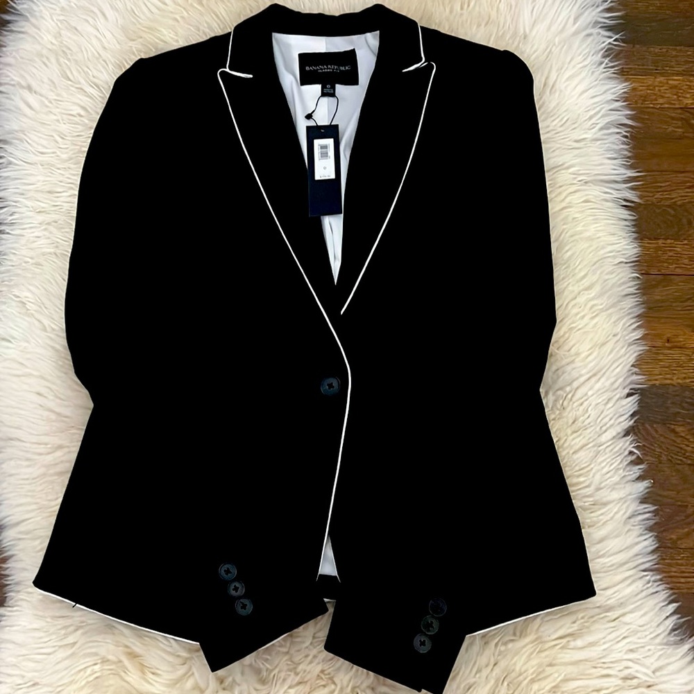 NWT beautiful black suit jacket with white piping detail!
